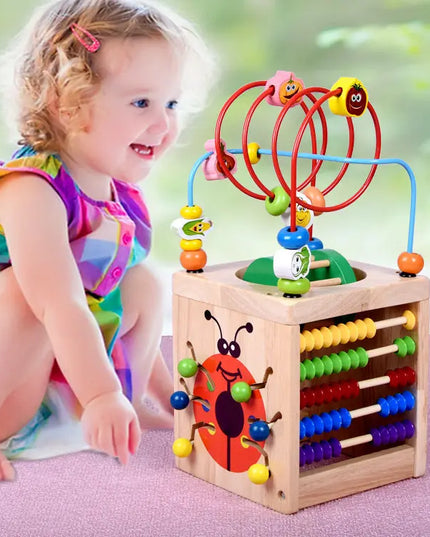Wooden children's puzzle beetle surrounded by large beads beldemo5-toys2