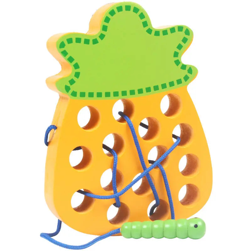 Practicing ability to thread intellectual wooden toys - Pineapple