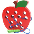 Practicing ability to thread intellectual wooden toys - Apple